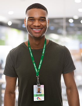 Man wearing ID card with gripper attachment
